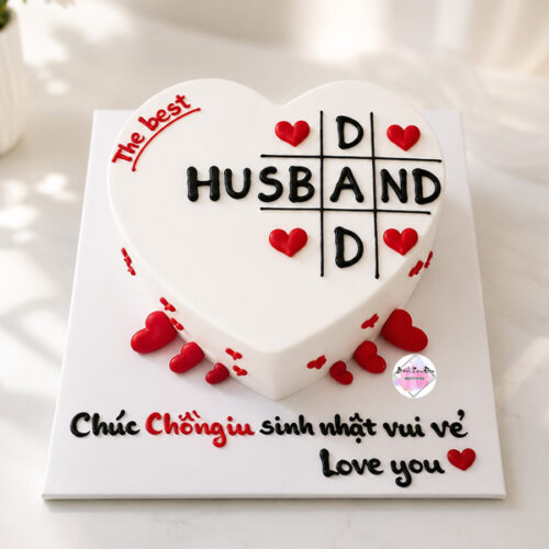 Bánh sinh nhật chồng yêu dễ thương hình trái tim màu trắng trang trí trái tim đỏ và thông điệp The Best Husband.